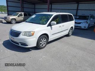 2013 Chrysler Town & Country Touring with VIN 2C4RC1BG0DR585138, listed as a IAAI auction lot 42186087 with 205,152 mi miles and . Bid and sale history available at DreamBid. Image 2.