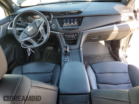 2023 Cadillac XT5 FWD Premium Luxury with VIN 1GYKNCR48PZ132957, listed as a Copart auction lot 42132845 with 27,312 mi miles and Salvage Title. Bid and sale history available at carsss.com. Image 8.