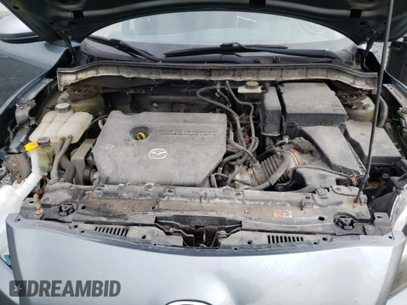 2012 Mazda 3 GX with VIN JM1BL1KFXC1532250, listed as a Copart auction lot 38709862 with 121,173 mi miles and Salvage Title. Bid and sale history available at carsss.com. Image 7.