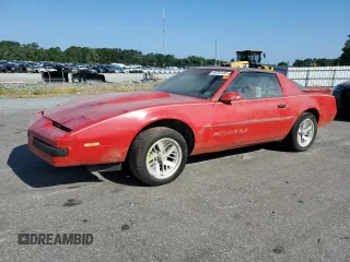 1990 Pontiac Firebird z VIN 1G2FS23E4LL206744, wystawiony jako Copart lot #66202485 z przebiegiem 152 272 mil mil oraz Czysty tytuł • Clean title. Historia ofert i sprzedaży dostępna na DreamBid. Obrazek 1.