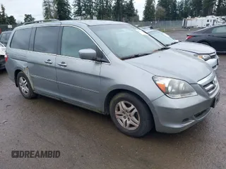 2006 Honda Odyssey EX-L z VIN 5FNRL387X6B075784, wystawiony jako IAAI lot #41922699 z przebiegiem 169 643 mil mil oraz . Historia ofert i sprzedaży dostępna na DreamBid. Obrazek 1.