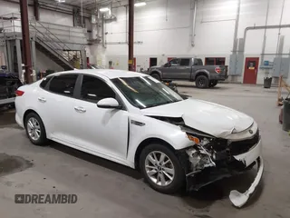 2018 Kia Optima LX with VIN 5XXGT4L38JG212678, listed as a IAAI auction lot 42068950 with 75,025 mi miles. Bid and sale history available at carsss.com. Image 1.