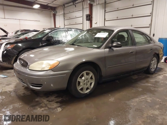 2006 Ford Taurus SE with VIN 1FAFP53U86A113947, listed as a IAAI auction lot 41753927 with 203,867 mi miles. Bid and sale history available at carsss.com. Image 21.