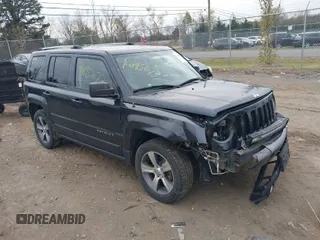 2016 Jeep Patriot Latitude with VIN 1C4NJRFBXGD524016, listed as a IAAI auction lot 40895673 with 157,465 mi miles. Bid and sale history available at carsss.com. Image 1.