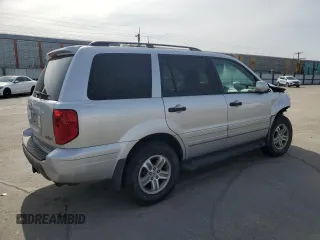 2005 Honda Pilot EX-L with VIN 5FNYF18575B061295, listed as a Copart auction lot 52235135 with 192,222 mi miles and Salvage Title. Bid and sale history available at carsss.com. Image 3.