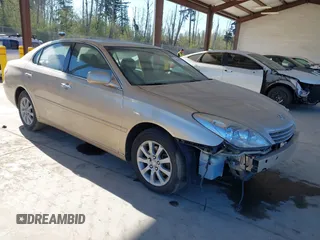 2004 Lexus ES 330 with VIN JTHBA30G340003869, listed as a IAAI auction lot 42024907 with 240,425 mi miles. Bid and sale history available at carsss.com. Image 1.