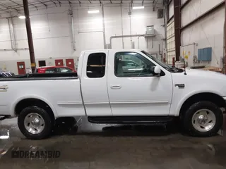 1998 Ford F-150 с VIN 1FTRX18L1WKB99239, выставлен на аукционе IAAI как лот 41987823 с пробегом 217 930 миль миль и . История ставок и продаж доступна на DreamBid. Изображение 13.