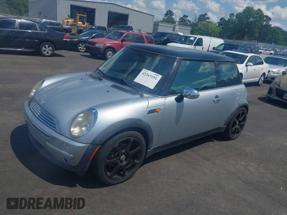 2002 MINI Hardtop with VIN WMWRC33462TC34269, listed as a IAAI auction lot 42265191 with Not Provided miles and . Bid and sale history available at DreamBid. Image 2.