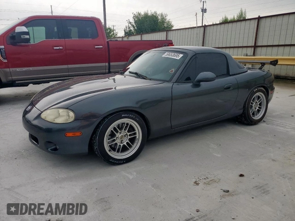 2001 Mazda MX-5 Miata with VIN JM1NB353210210976, listed as a Copart auction lot 59653695 with 152,250 mi miles and Salvage title. Bid and sale history available at DreamBid. Image 1.