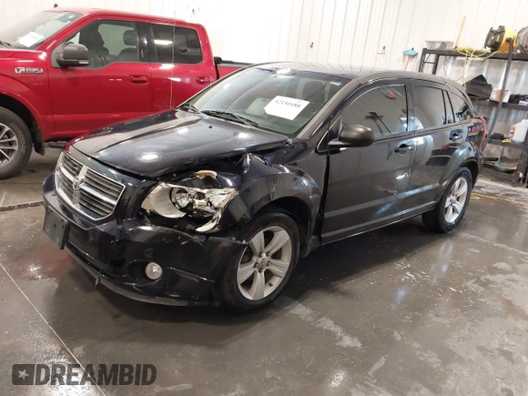 2011 Dodge Caliber Mainstreet with VIN 1B3CB3HA2BD148279, listed as a IAAI auction lot 42150488 with 131,278 mi miles and . Bid and sale history available at DreamBid. Image 18.