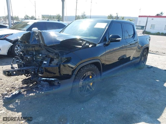 2022 Rivian R1T Launch Edition with VIN 7FCTGAAL1NN010340, listed as a IAAI auction lot 41656762 with 0 mi miles. Bid and sale history available at carsss.com. Image 2.