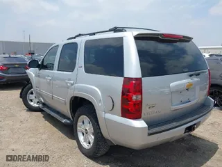 2013 Chevrolet Tahoe LT with VIN 1GNSKBE02DR110158, listed as a IAAI auction lot 36846228 with 125,426 mi miles. Bid and sale history available at carsss.com. Image 3.