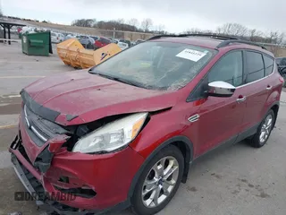 2014 Ford Escape SE with VIN 1FMCU9G90EUD89356, listed as a IAAI auction lot 41841229 with 148,997 mi miles and . Bid and sale history available at carsss.com. Image 2.