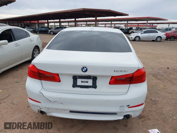 2018 BMW 5 Series 530e xDrive with VIN WBAJB1C55JB374652, listed as a IAAI auction lot 41812287 with 84,593 mi miles and . Bid and sale history available at carsss.com. Image 6.