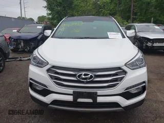 2018 Hyundai Santa Fe Ultimate with VIN 5NMZW4LA3JH088349, listed as a IAAI auction lot 42168983 with 66,884 mi miles and . Bid and sale history available at DreamBid. Image 12.