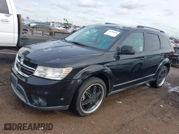 2014 Dodge Journey SXT with VIN 3C4PDCBG1ET127798, listed as a IAAI auction lot 41799898 with 178,873 mi miles and . Bid and sale history available at DreamBid. Image 2.