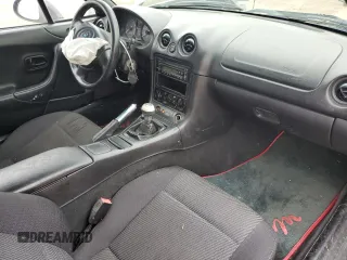 1999 Mazda MX-5 Miata with VIN JM1NB3531X0102616, listed as a Copart auction lot 59779415 with 194,494 mi miles and Salvage title. Bid and sale history available at DreamBid. Image 8.