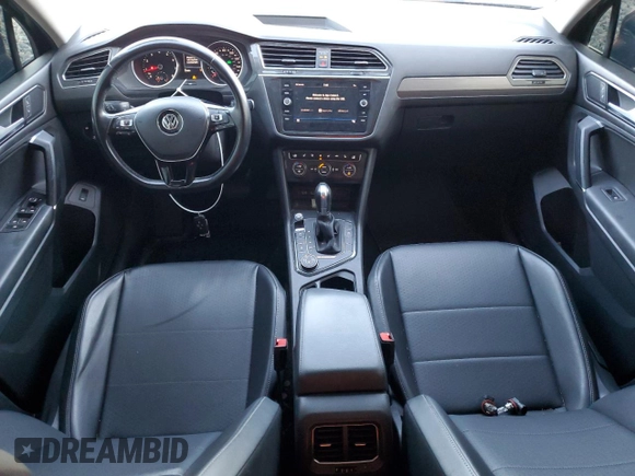 2018 Volkswagen Tiguan SEL с VIN 3VV2B7AX1JM066581, выставлен на аукционе Copart как лот 60535175 с пробегом 57 809 миль миль и Списание • Salvage title. История ставок и продаж доступна на DreamBid. Изображение 8.