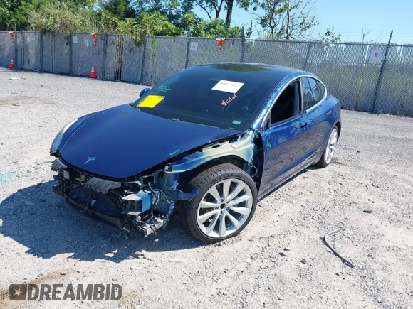 2019 Tesla Model 3 Mid Range with VIN 5YJ3E1EA6KF402308, listed as a IAAI auction lot 40077902 with 89,794 mi miles and . Bid and sale history available at carsss.com. Image 19.