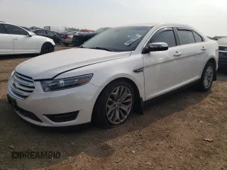 2016 Ford Taurus Limited with VIN 1FAHP2F8XGG124551, listed as a Copart auction lot 60621695 with 103,668 mi miles and Salvage title. Bid and sale history available at DreamBid. Image 1.