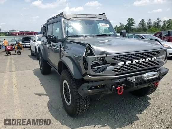 2023 Ford Bronco z VIN 1FMEE5DP0PLA94154, wystawiony jako Copart lot #62035445 z przebiegiem 47 559 mil mil oraz Szkoda całkowita • Salvage title. Historia ofert i sprzedaży dostępna na DreamBid. Obrazek 13.