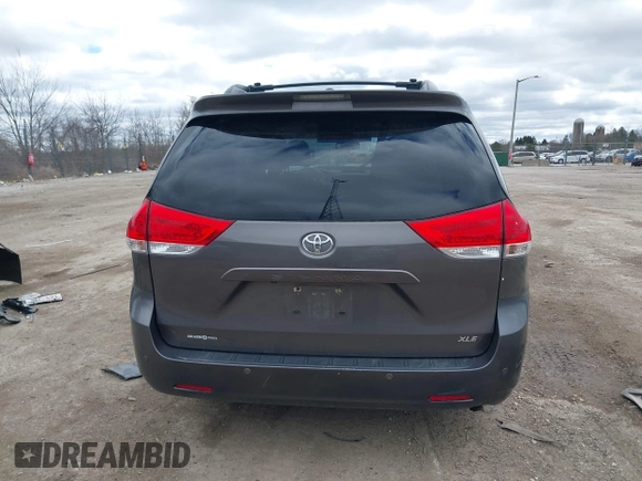 2014 Toyota Sienna XLE with VIN 5TDYK3DC0ES422700, listed as a IAAI auction lot 42049181 with 147,498 mi miles. Bid and sale history available at carsss.com. Image 16.