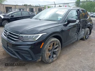 2022 Volkswagen Tiguan SE z VIN 3VV2B7AX4NM093585, wystawiony jako IAAI lot #42267105 z przebiegiem 31 239 mil mil oraz . Historia ofert i sprzedaży dostępna na DreamBid. Obrazek 17.