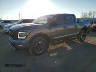 2024 Nissan Titan Pro-4X z VIN 1N6AA1ED7RN106901, wystawiony jako Copart lot #43573995 z przebiegiem 42 973 mil mil oraz Szkoda całkowita • Salvage title. Historia ofert i sprzedaży dostępna na DreamBid. Obrazek 1.