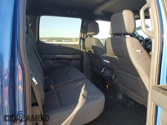 2023 Ford F-150 XL with VIN 1FTFW1E51PKF30933, listed as a Copart auction lot 76121834 with 26,267 mi miles and Salvage Title. Bid and sale history available at carsss.com. Image 10.