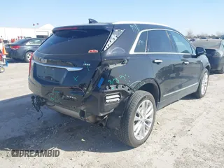 2017 Cadillac XT5 Platinum AWD z VIN 1GYKNFRS7HZ103127, wystawiony jako IAAI lot #41830037 z przebiegiem 82 480 mil mil oraz . Historia ofert i sprzedaży dostępna na DreamBid. Obrazek 4.