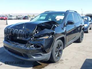 2016 Jeep Cherokee Altitude with VIN 1C4PJLAB2GW329397, listed as a IAAI auction lot 42294033 with 96,812 mi miles and . Bid and sale history available at DreamBid. Image 6.