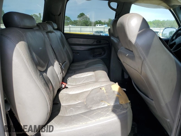 2003 Chevrolet Suburban LT z VIN 1GNEC16Z23J338840, wystawiony jako Copart lot #59962715 z przebiegiem 264 250 mil mil oraz Szkoda całkowita • Salvage title. Historia ofert i sprzedaży dostępna na DreamBid. Obrazek 11.