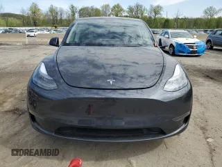 2025 Tesla Model Y Long Range with VIN 7SAYGDED7SF320702, listed as a Copart auction lot 54655325 with 1,169 mi miles and Salvage Title. Bid and sale history available at DreamBid. Image 5.