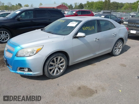 2013 Chevrolet Malibu LTZ with VIN 1G11H5SA3DF248223, listed as a IAAI auction lot 42098114 with 186,131 mi miles and . Bid and sale history available at DreamBid. Image 2.