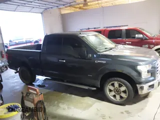 2015 Ford F-150 XLT with VIN 1FTEX1EP3FKE57475, listed as a IAAI auction lot 41435394 with 233,560 mi miles. Bid and sale history available at carsss.com. Image 13.