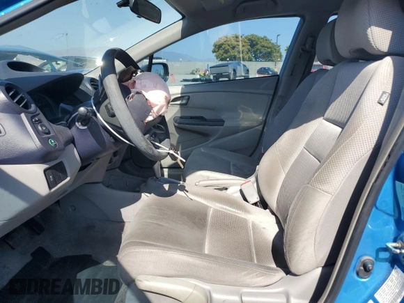 2010 Honda Insight EX with VIN JHMZE2H75AS006595, listed as a Copart auction lot 61078695 with 158,838 mi miles and Salvage title. Bid and sale history available at DreamBid. Image 7.