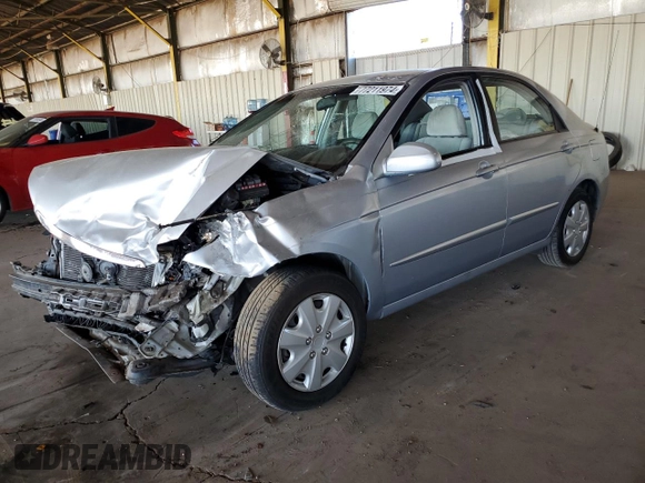 2006 Kia Spectra EX with VIN KNAFE121465332510, listed as a Copart auction lot 77211974 with 148,964 mi miles and Salvage Title. Bid and sale history available at carsss.com. Image 1.
