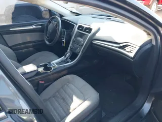 2016 Ford Fusion S with VIN 3FA6P0G75GR155572, listed as a IAAI auction lot 41847452 with 133,976 mi miles. Bid and sale history available at carsss.com. Image 5.