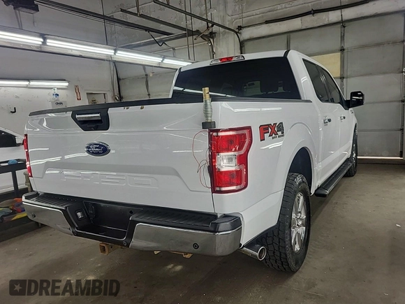 2018 Ford F-150 XL with VIN 1FTEW1E59JKD11351, listed as a IAAI auction lot 42663848 with 128,761 mi miles and . Bid and sale history available at DreamBid. Image 46.