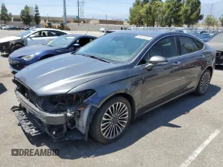 2018 Ford Fusion Titanium с VIN 3FA6P0SUXJR211607, выставлен на аукционе Copart как лот 64643035 с пробегом 105 155 миль миль и Списание • Salvage title. История ставок и продаж доступна на DreamBid. Изображение 1.