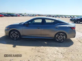 2025 Nissan Sentra SR z VIN 3N1AB8DV8SY309598, wystawiony jako IAAI lot #42460527 z przebiegiem 3 690 mil mil oraz . Historia ofert i sprzedaży dostępna na DreamBid. Obrazek 14.