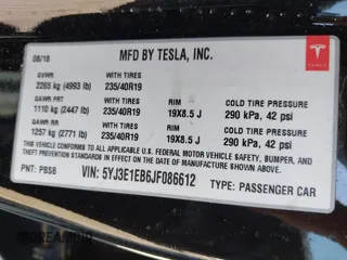 2018 Tesla Model 3 Long Range Battery z VIN 5YJ3E1EB6JF086612, wystawiony jako IAAI lot #42149440 z przebiegiem 101 170 mil mil oraz . Historia ofert i sprzedaży dostępna na DreamBid. Obrazek 9.