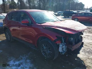 2017 Mazda CX-5 Touring with VIN JM3KFBCL1H0227290, listed as a IAAI auction lot 41400188 with 58,801 mi miles. Bid and sale history available at carsss.com. Image 1.
