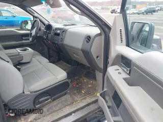 2007 Ford F-150 STX with VIN 1FTRX14W17FA67396, listed as a IAAI auction lot 41007693 with 273,113 mi miles. Bid and sale history available at carsss.com. Image 5.
