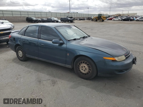 2002 Saturn LS z VIN 1G8JS54F72Y542236, wystawiony jako Copart lot #51253985 z przebiegiem 203 575 mil mil oraz Szkody całkowita. Historia ofert i sprzedaży dostępna na DreamBid. Obrazek 4.