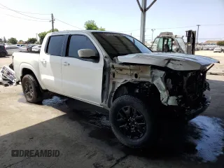 2022 Nissan Frontier SV with VIN 1N6ED1EJ6NN617301, listed as a Copart auction lot 60572395 with 77,269 mi miles and Salvage title. Bid and sale history available at DreamBid. Image 4.