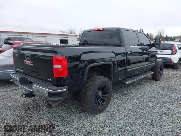 2018 GMC Sierra 2500HD SLT with VIN 1GT12TEY4JF203731, listed as a IAAI auction lot 41858306 with 86,931 mi miles. Bid and sale history available at carsss.com. Image 4.