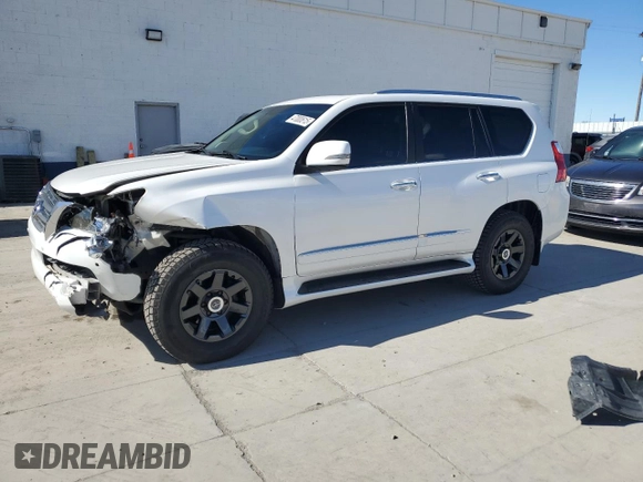2012 Lexus GX 460 Premium with VIN JTJJM7FX4C5042312, listed as a Copart auction lot 47000615 with 242,046 mi miles and Salvage title. Bid and sale history available at DreamBid. Image 1.