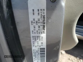 2013 Dodge Grand Caravan SXT with VIN 2C4RDGCG0DR582254, listed as a Copart auction lot 54735205 with 126,071 mi miles and Salvage Title. Bid and sale history available at DreamBid. Image 13.