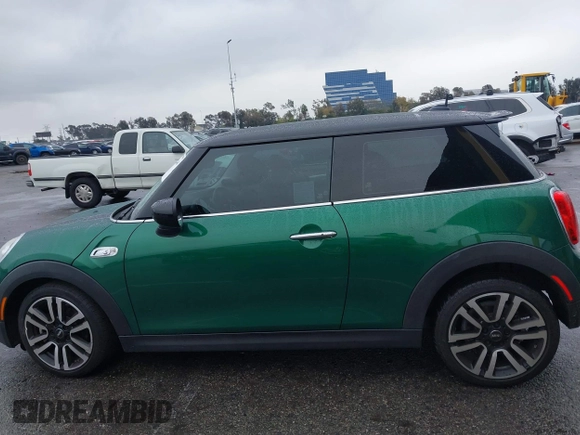 2020 MINI Hardtop Cooper S z VIN WMWXR5C08L2L85651, wystawiony jako IAAI lot #41521346 z przebiegiem 40 863 mil mil oraz . Historia ofert i sprzedaży dostępna na DreamBid. Obrazek 15.